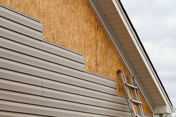 Professional Siding Installation technician working in Bedford, OH